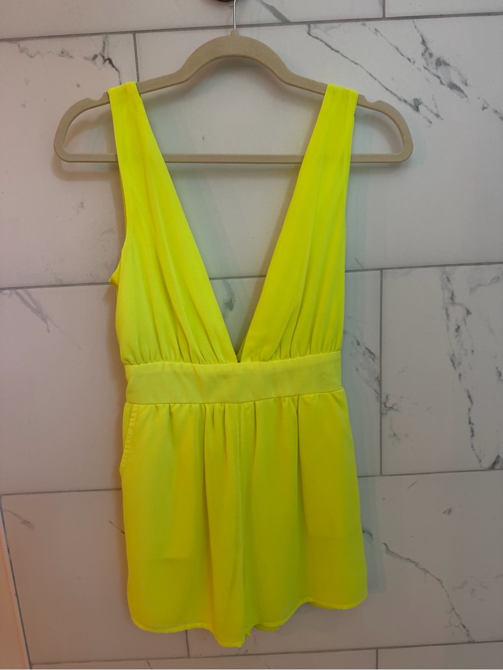 the clothing company Neon Yellow One-Piece Romper